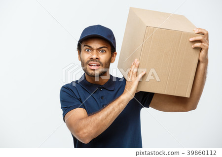 Delivery Concept - Portrait of Serious African 39860112