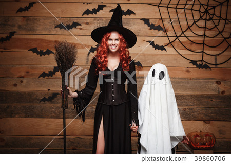 Halloween Concept - Witch mother and little white Halloween Concept - Witch mother and little white 39860706