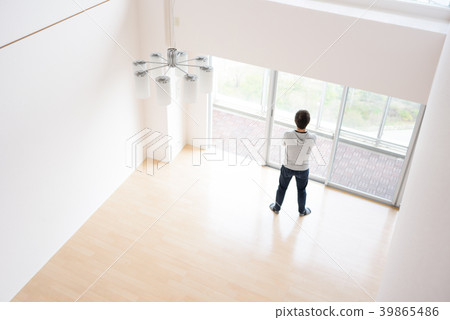 A man standing in the living room A man standing in the living room 39865486