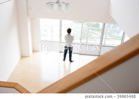 A man standing in the living room A man standing in the living room 39865488