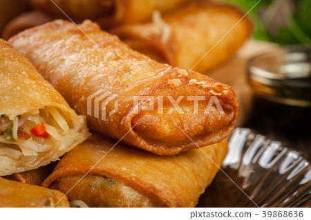 Spring rolls with chicken and vegetables Spring rolls with chicken and vegetables 39868636