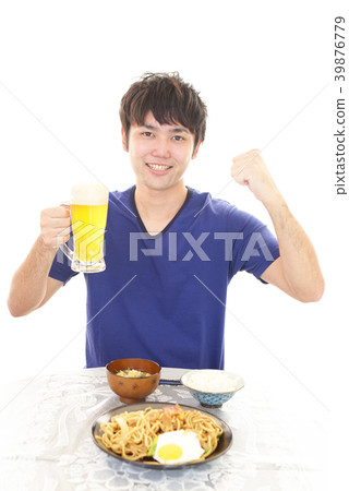 A man who enjoys meals 39876779