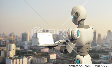 Robot using a laptop computer with blank screen Robot using a laptop computer with blank screen 39877272