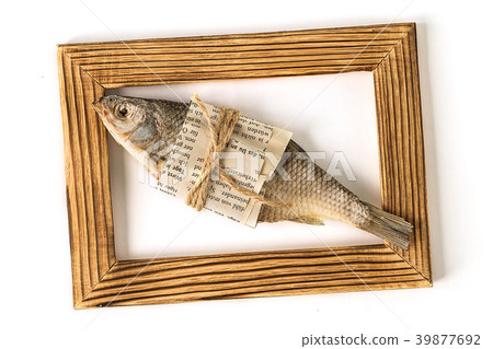 Isolated dried fishes for beer on white background 39877692