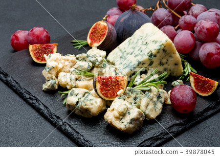 Slice of French Roquefort cheese with figs Slice of French Roquefort cheese with figs 39878045