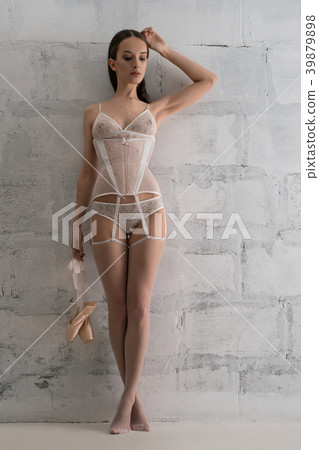 Sexy slim brunette in romantic lingerie shot Sexy slim brunette in romantic lingerie shot 39879898