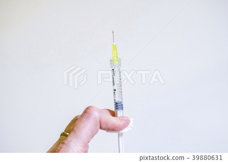 syringe with the drug syringe with the drug 39880631