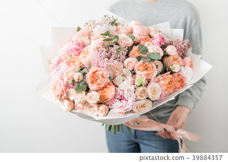 bouquet of beautiful flowers in women's hands bouquet of beautiful flowers in women's hands 39884357