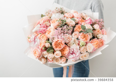 bouquet of beautiful flowers in women's hands bouquet of beautiful flowers in women's hands 39884358