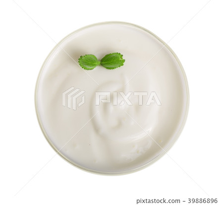Bowl of yogurt with mint leaf isolated on white 39886896