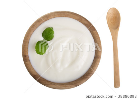yogurt in a wooden bowl with mint leaf isolated on 39886898