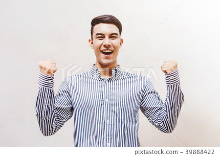 Young and Happy Businessman in Cheerful posture 39888422