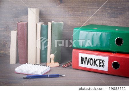 Invoices. Binder on desk in the office. Business background Invoices. Binder on desk in the office. Business background 39888531