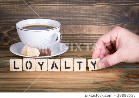 loyalty. Wooden letters on the office desk, informative and communication background 39888553