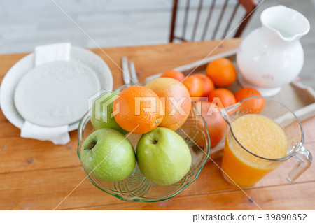 Still life: oranges and glass of juice on a wooden Still life: oranges and glass of juice on a wooden 39890852