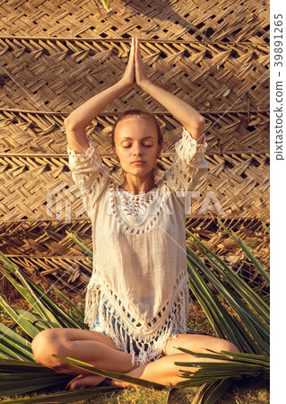 meditating on a palm leaf meditating on a palm leaf 39891265