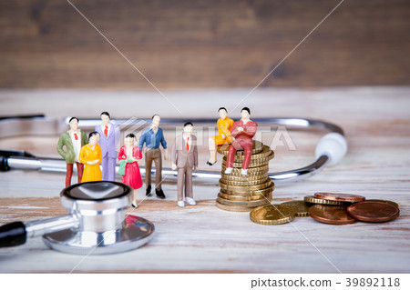 Medical care and expenses, health insurance. Colorful Human miniatures 39892118
