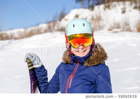Portrait of sporty woman wearing helmet with 39892639