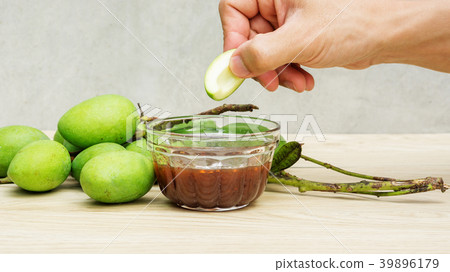 Green sour mango (raw mango) with sweet fish sauce Green sour mango (raw mango) with sweet fish sauce 39896179