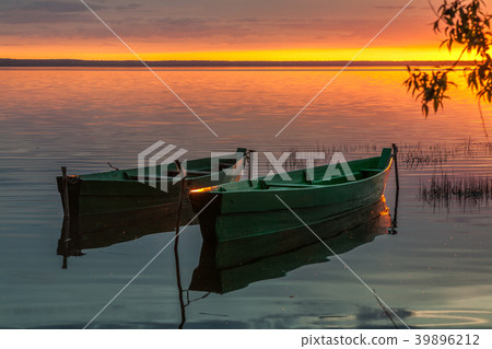 two boats at sunset two boats at sunset 39896212