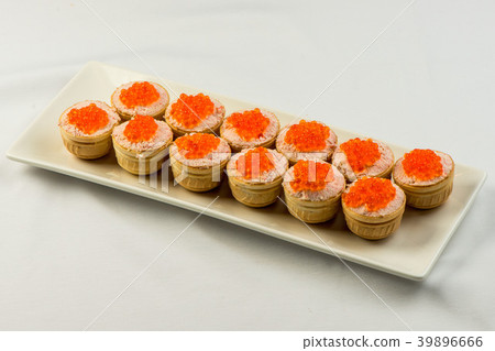 Tartlets with cheese and red caviar. Selective Tartlets with cheese and red caviar. Selective 39896666