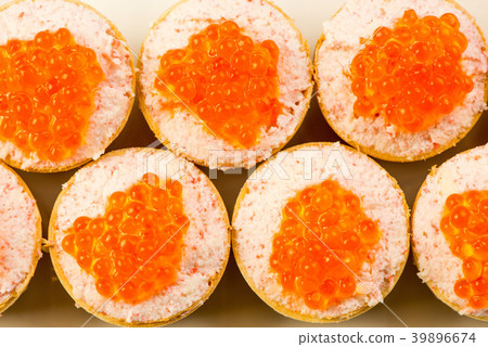 Tartlets with cheese and red caviar. Selective Tartlets with cheese and red caviar. Selective 39896674