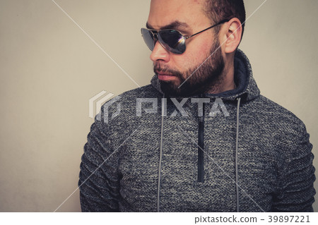 Handsome young man in sunglasses. 39897221