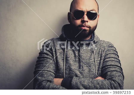 Handsome young man in sunglasses. 39897233