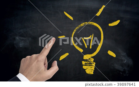 Hand pointing on lightbulb concept 39897641