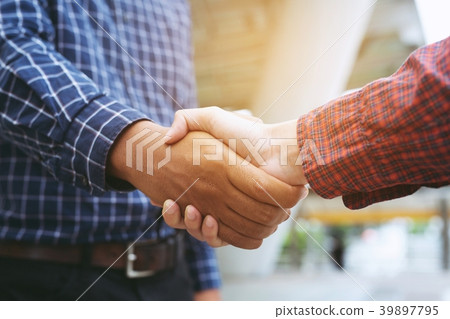 Good deal. Close-up of handshaking.  39897795
