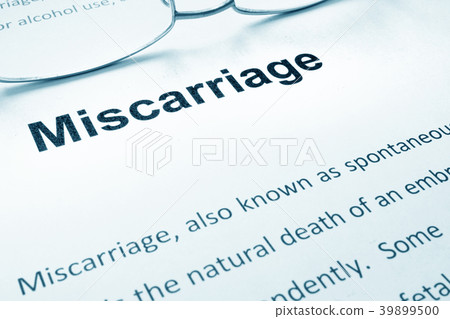 Miscarriage sign on a paper and glasses. Miscarriage sign on a paper and glasses. 39899500