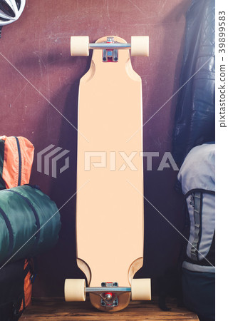 Skateboard mockup, blank longboard on grunge backg Skateboard mockup, blank longboard on grunge backg 39899583