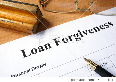 Loan forgiveness form on a wooden table. Loan forgiveness form on a wooden table. 39900103