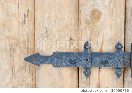 Part of wooden gate with forged hinges 39900716