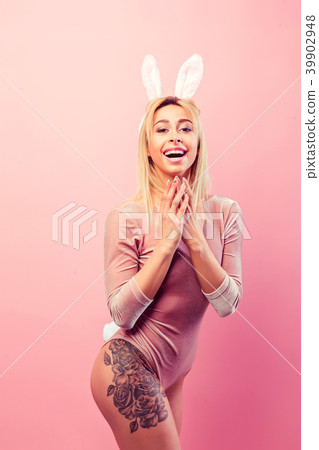 Seductive woman in bunny suit 39902948