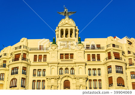 Ancient building at the crossroad of Carrer de 39904069