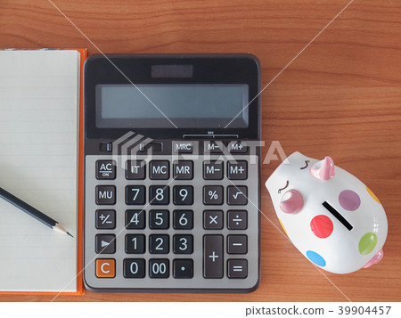 goals list with notebook , Piggy Bank , calculator 39904457