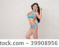 A woman wearing a bikini has various poses and expressions in front of a white background. 39908956