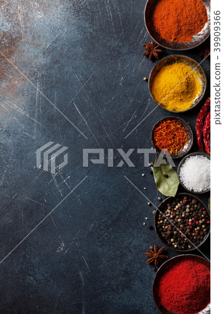 Colorful spices on stone table Colorful spices on stone table 39909366