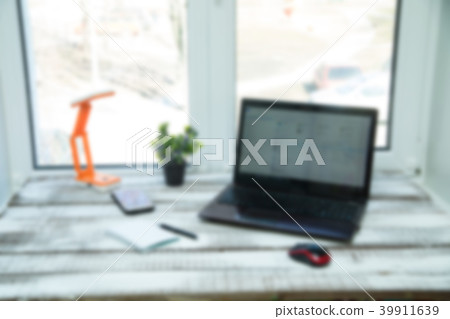 Laptop on the wood table . Laptop on the wood table . 39911639