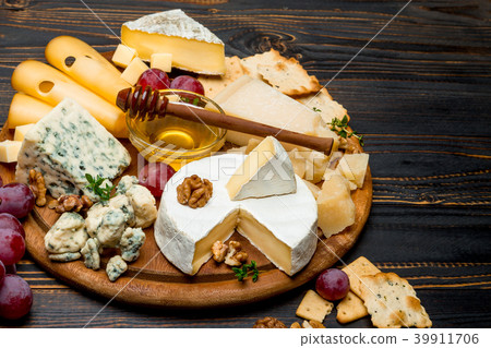 various types of cheese - brie, camembert 39911706