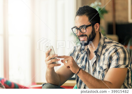 Bearded Man with Phone Bearded Man with Phone 39915482