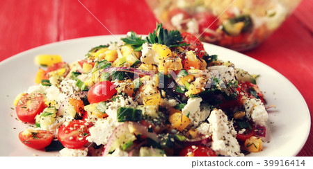 Colorful vegetable mix. Simple low calories salad. Colorful vegetable mix. Simple low calories salad. 39916414