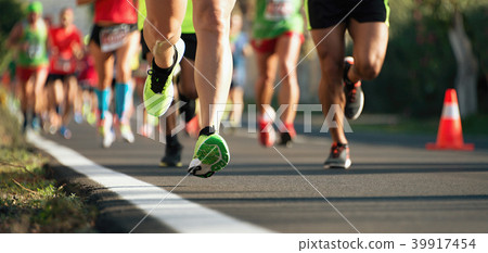 Marathon running in the light of evening 39917454