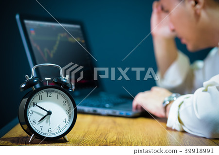 Tired & headache asian businessman work overtime Tired & headache asian businessman work overtime 39918991