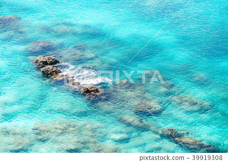 sea surface wit rock aerial 39919308