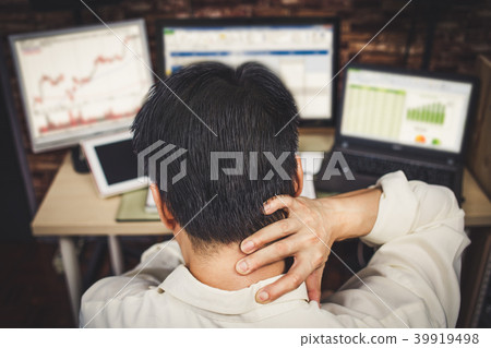 asian men stressful working with computer 39919498