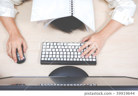 Tired & headache asian businessman work overtime 39919644