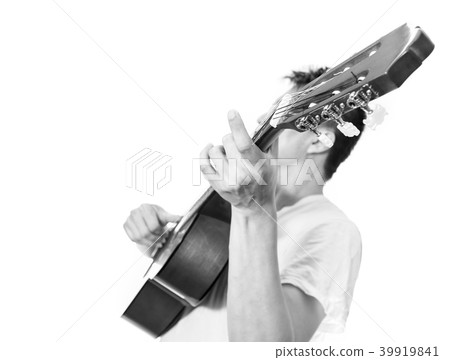 male musician playing acoustic guitar 39919841