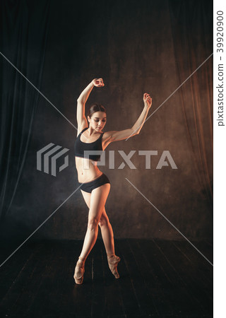 Classical ballet dancer in black practice training Classical ballet dancer in black practice training 39920900
